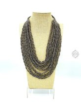 Load image into Gallery viewer, Silver Colored Hand Beaded Necklace From Bali | Multi-Strand Loop & Ball Closure Eye-Catching Design