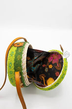 Load image into Gallery viewer, Small Round Bali Beaded Handbag, Handmade Green & Yellow Flower Design, Glass Beading on Ata Straw Purse, Leather Crossbody Strap