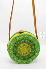 Load image into Gallery viewer, Small Round Bali Beaded Handbag, Handmade Green & Yellow Flower Design, Glass Beading on Ata Straw Purse, Leather Crossbody Strap