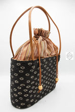 Load image into Gallery viewer, Large Bali Beaded Tote Bag, Handmade Black and Silver Flower Beading on Ata Straw Purse, Drawstring Batik Lining with Leather Straps
