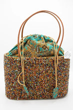 Load image into Gallery viewer, Large Bali Beaded Tote Bag, Handmade Multi-color Beading on Ata Straw Purse, Drawstring Batik Lining with Leather Straps
