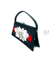 Load image into Gallery viewer, Tweed Fabric - Large Trapezoid Handbag with Vintage Pin | Floral Accessories | Black &amp; Red Shoulder Handbag | 1950s Glamour
